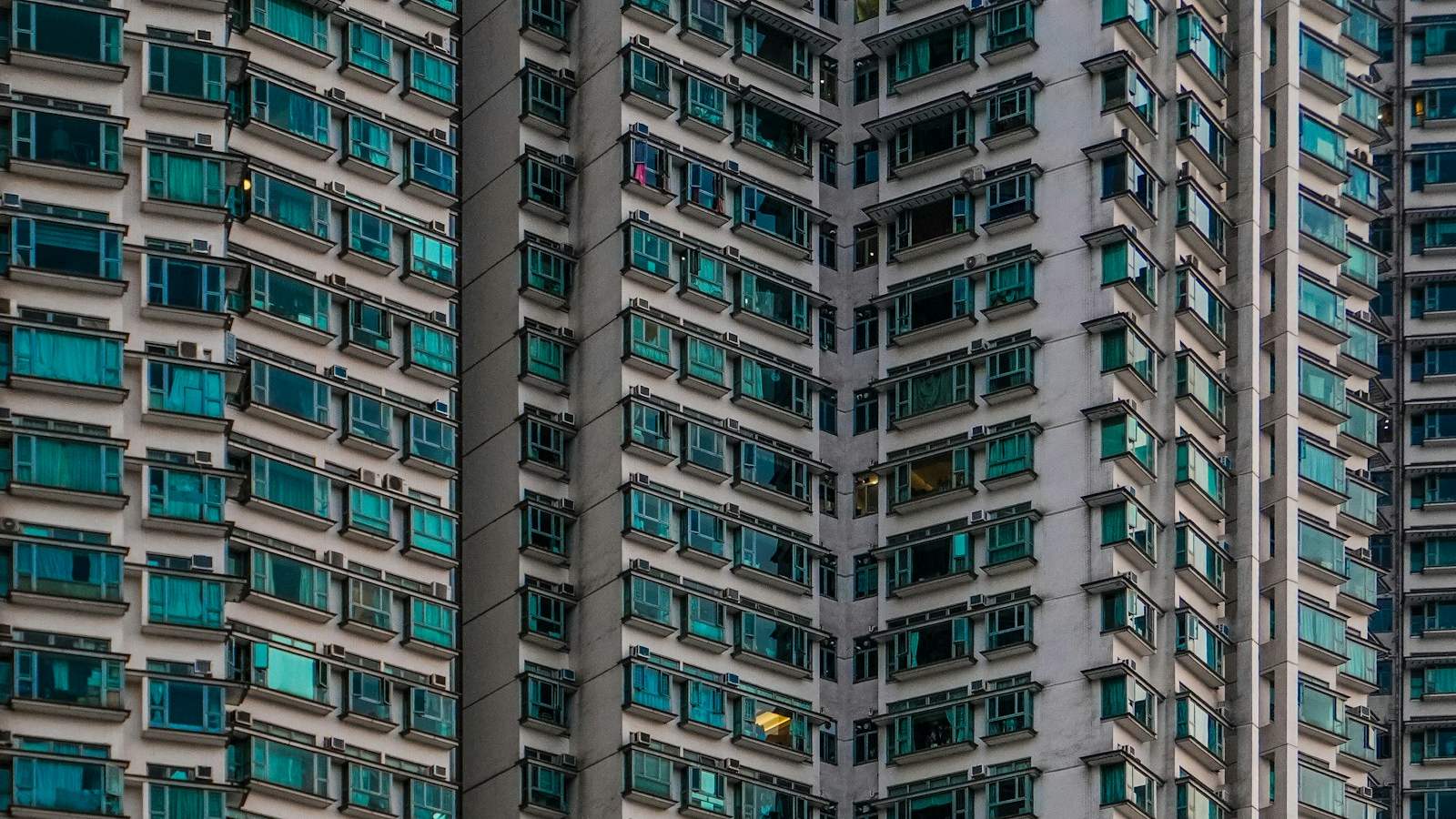 High-rise apartment building with rows of windows
